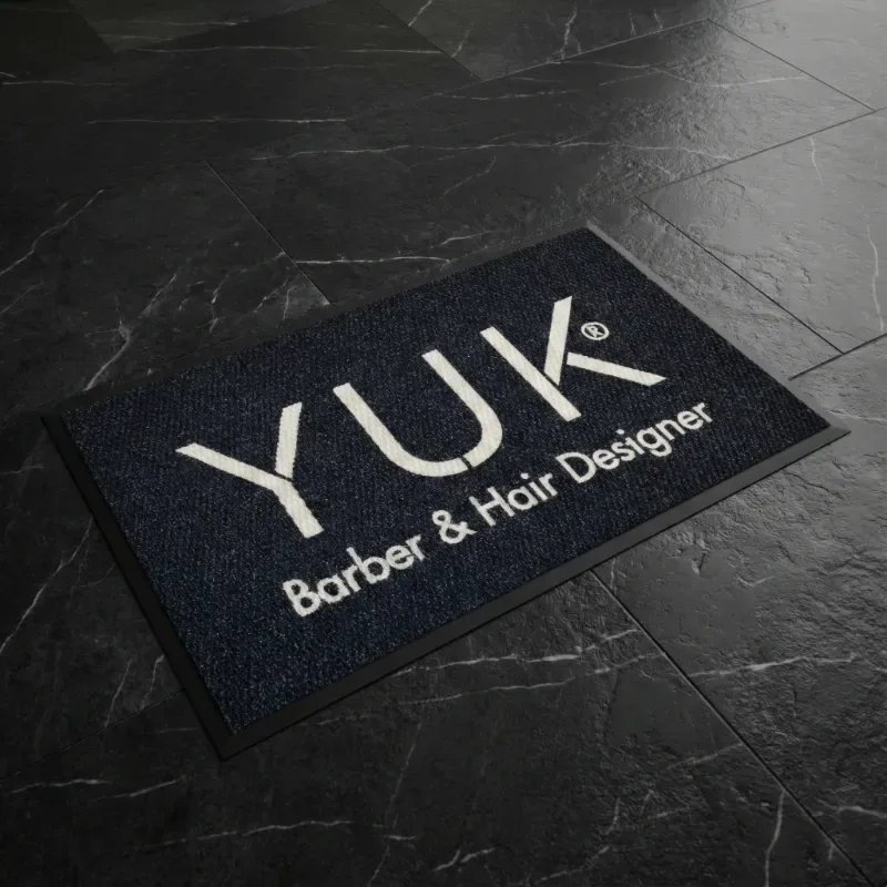Berber logolu paspas - YUK Barber & Hair Designer için üretilen 60x100 siyah paspas.